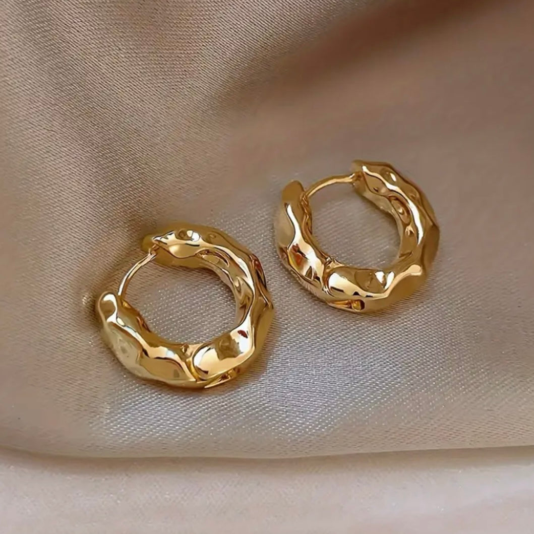 Golden pleated earrings